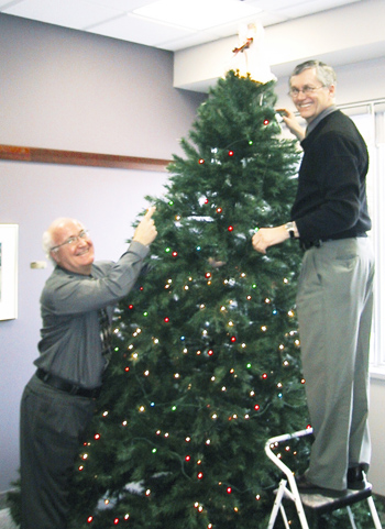 Decorating the OUAC Christmas tree